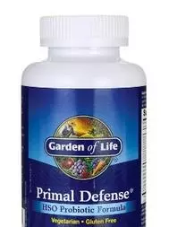 A bottle of primal defense with a white label.